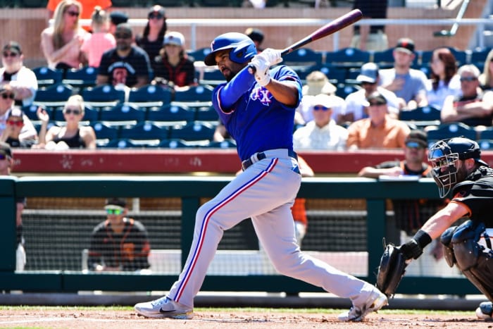 Apr 1, 2022; Scottsdale, Arizona, USA; Texas Rangers second baseman Marcus Semien (2) grounds out in the first inning against the San Francisco Giants at Scottsdale Stadium. Mandatory Credit: Matt Kartozian-USA TODAY Sports